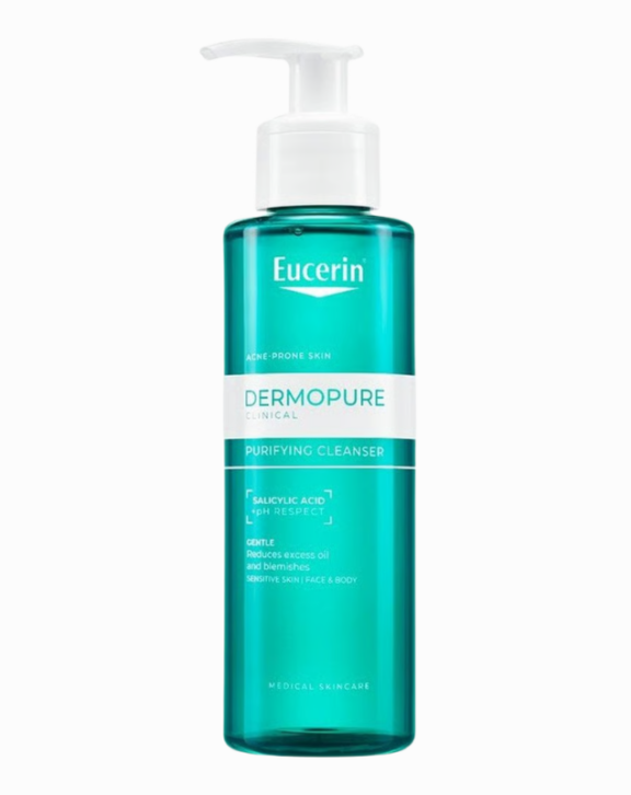 Découvrez le gel nettoyant Eucerin DermoPure, spécialement formulé pour les peaux à imperfections. Ce soin visage purifiant de 200 ml est l'allié idéal pour retrouver une peau saine et éclatante. Sa formule douce élimine efficacement les impuretés, l'excès de sébum et les résidus de maquillage, tout en respectant l'équilibre naturel de votre épiderme. Enrichi en ingrédients actifs, ce gel nettoyant aide à prévenir l'apparition des imperfections et à réduire les brillances. Sa texture légère et rafraîchissante pénètre rapidement, laissant votre peau propre, lisse et revitalisée. Utilisé quotidiennement, il contribue à affiner le grain de peau et à réduire les pores dilatés. Idéal pour les peaux mixtes à grasses, le gel nettoyant Eucerin DermoPure est non comédogène et convient également aux peaux sensibles. Offrez à votre visage le soin qu'il mérite et adoptez ce gel nettoyant dans votre routine beauté pour un teint pur et éclatant de santé.